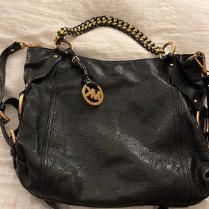 Michael Kors genuine leather handbag. Black & Gold.